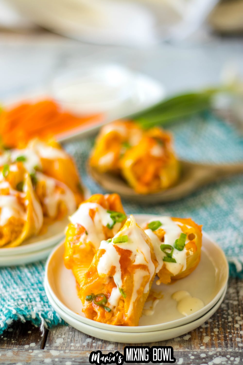 buffalo stuffed shells on a small white plate