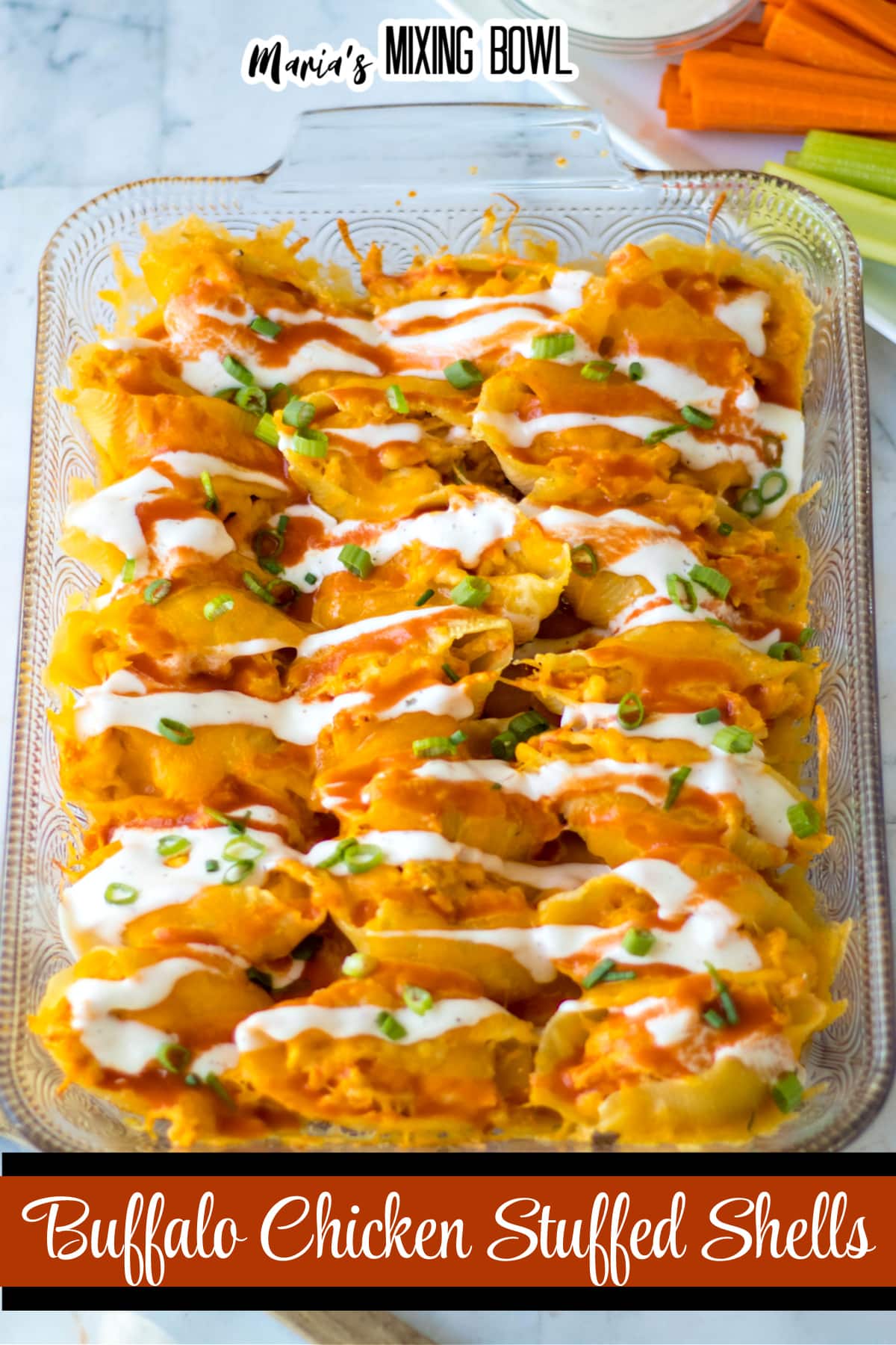 buffalo stuffed shells in a glass baking dish