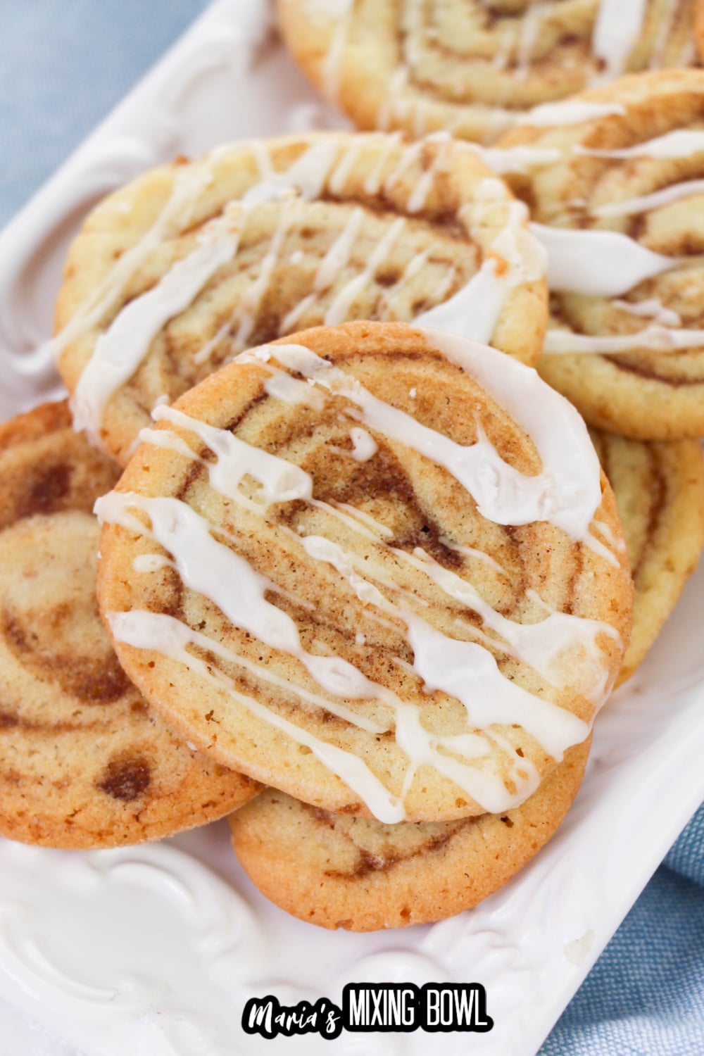 stack of cinnamon bun cookies on a white plate