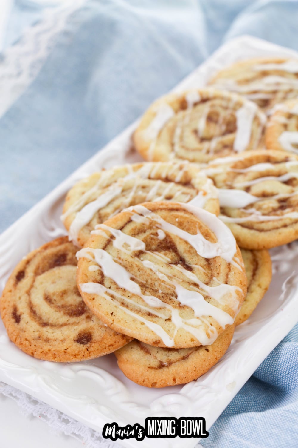 stack of cinnamon bun cookies on a white plate