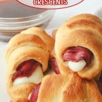 stack of french dip crescents on a white plate