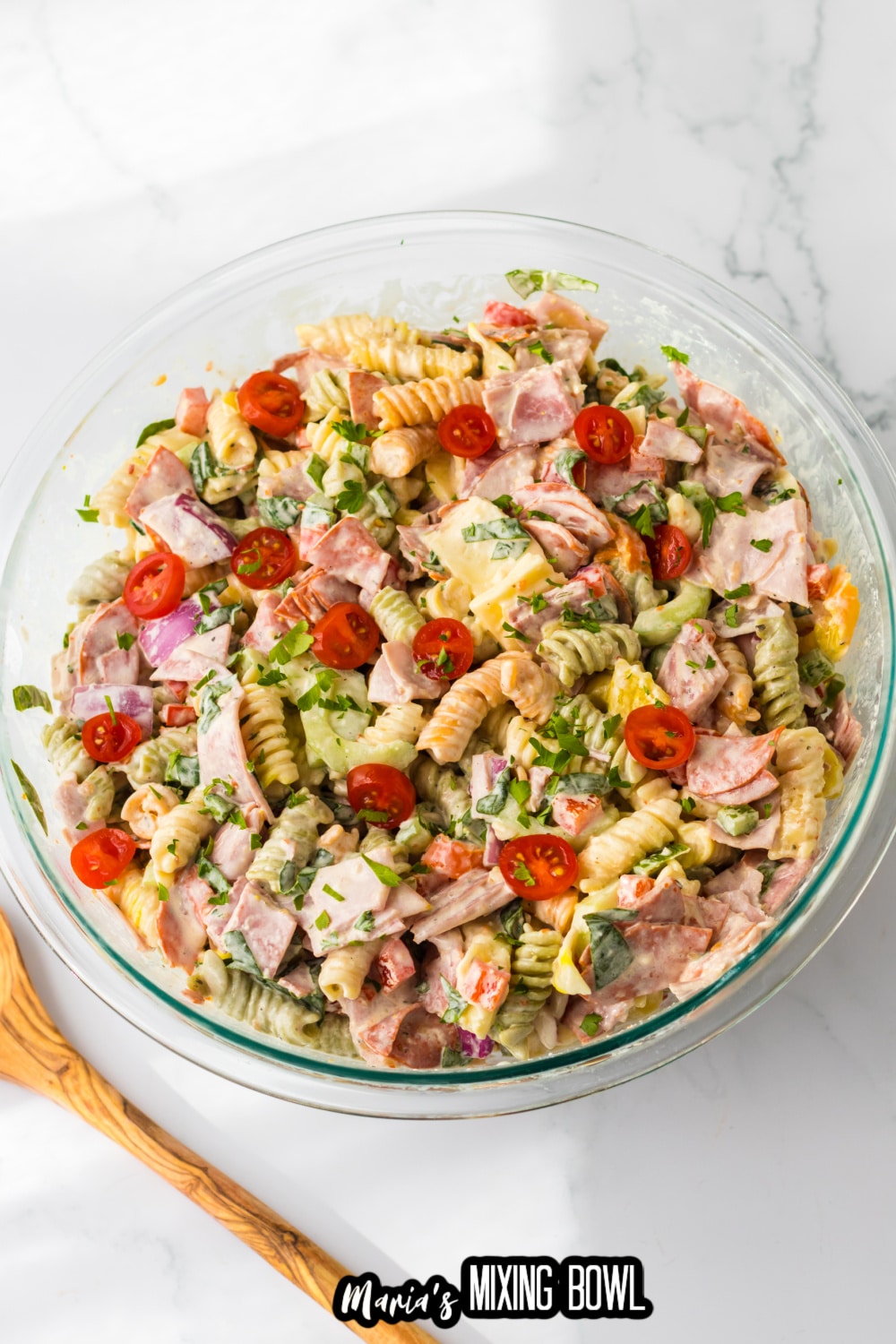 italian sub pasta salad in a glass mixing bowl