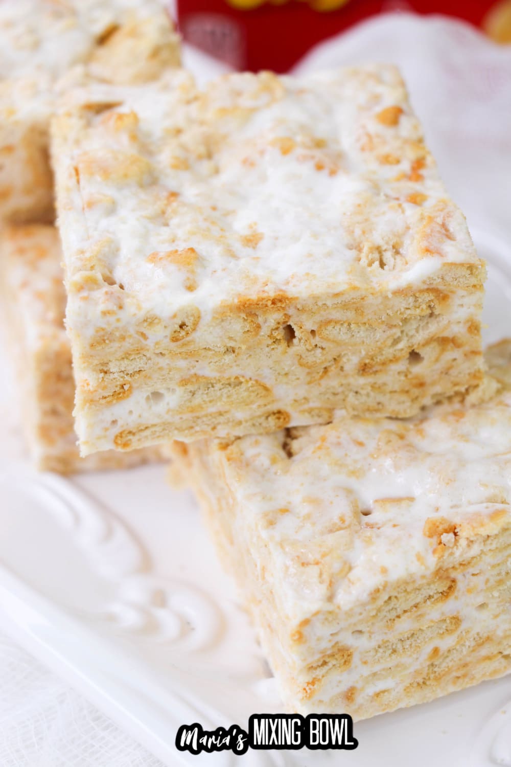 cut ritz cracker treats stacked on a white plate