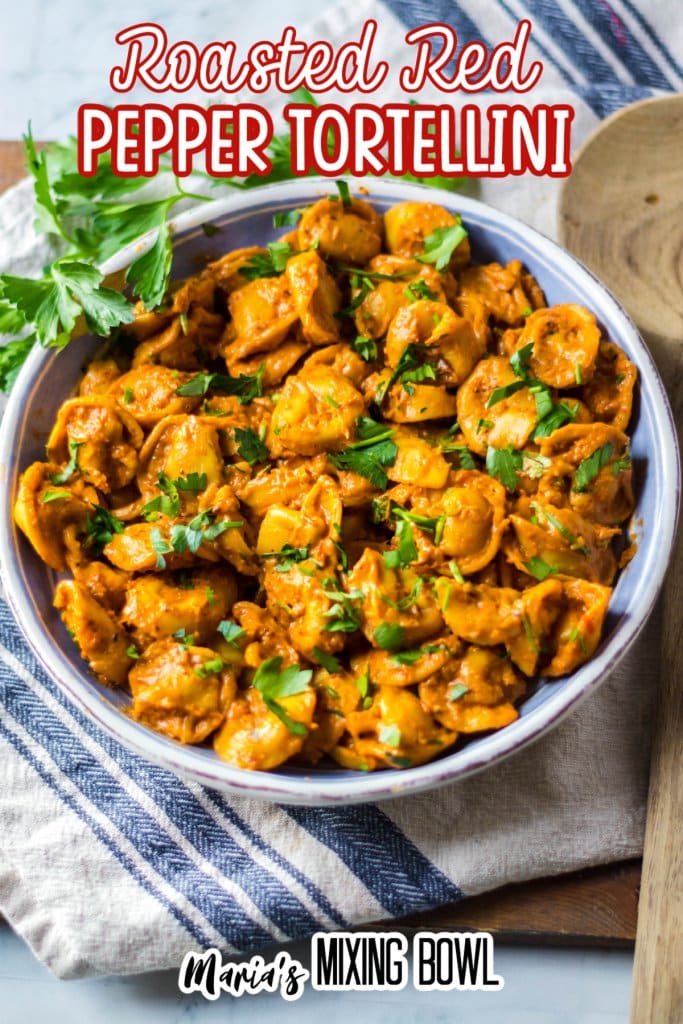 roasted red pepper tortellini in a blue and white bowl