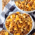 chex mix in a large white bowl with the name in text for pinterest