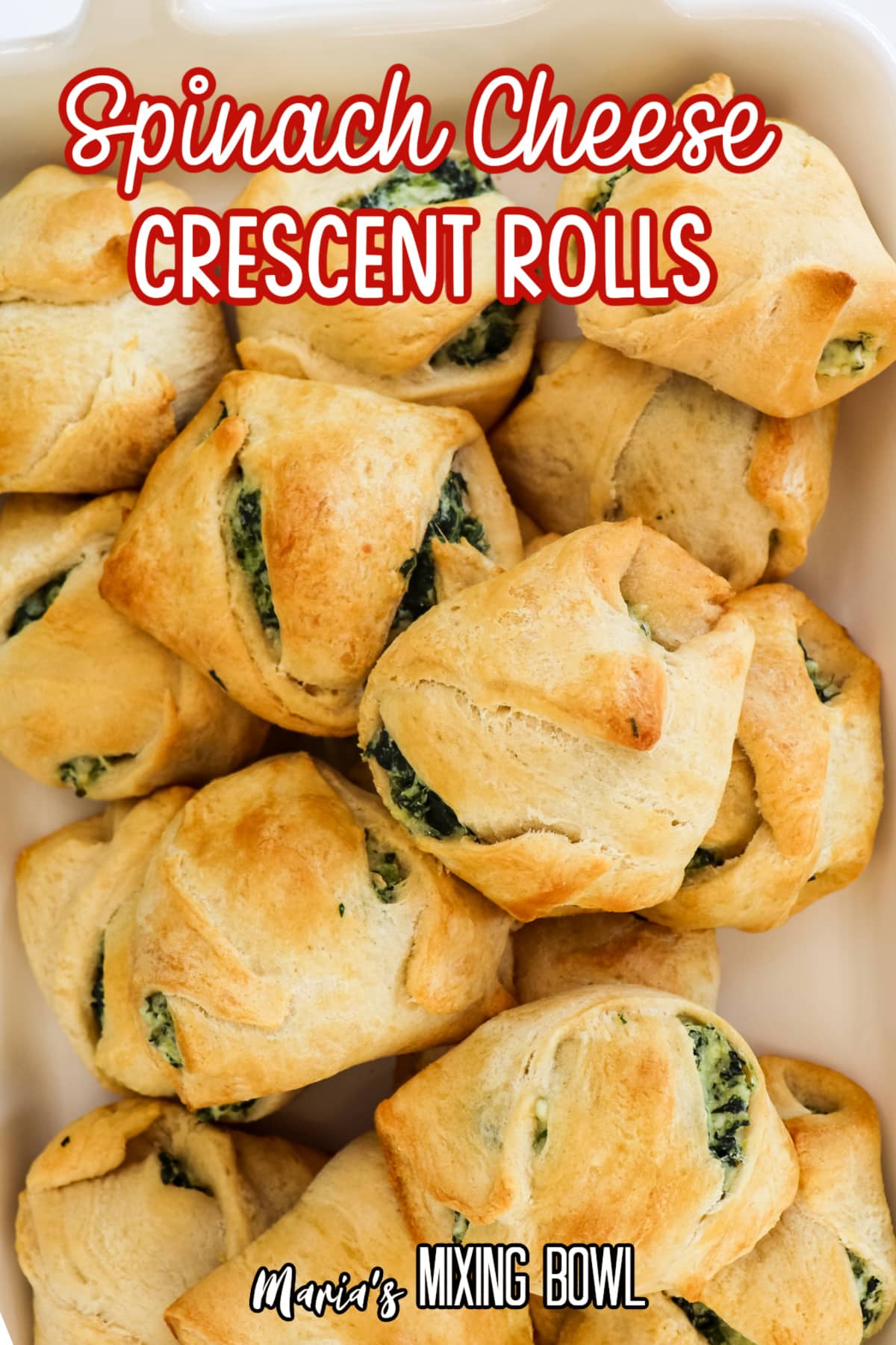 spinach cheese crescent rolls on a white platter with the name in text for pinterest