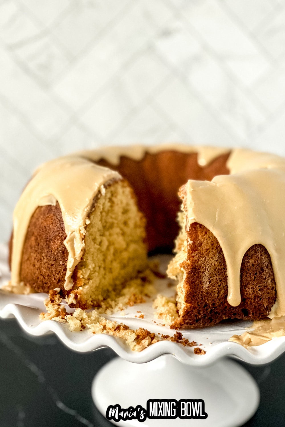 close up of a pound cake with a slice removed