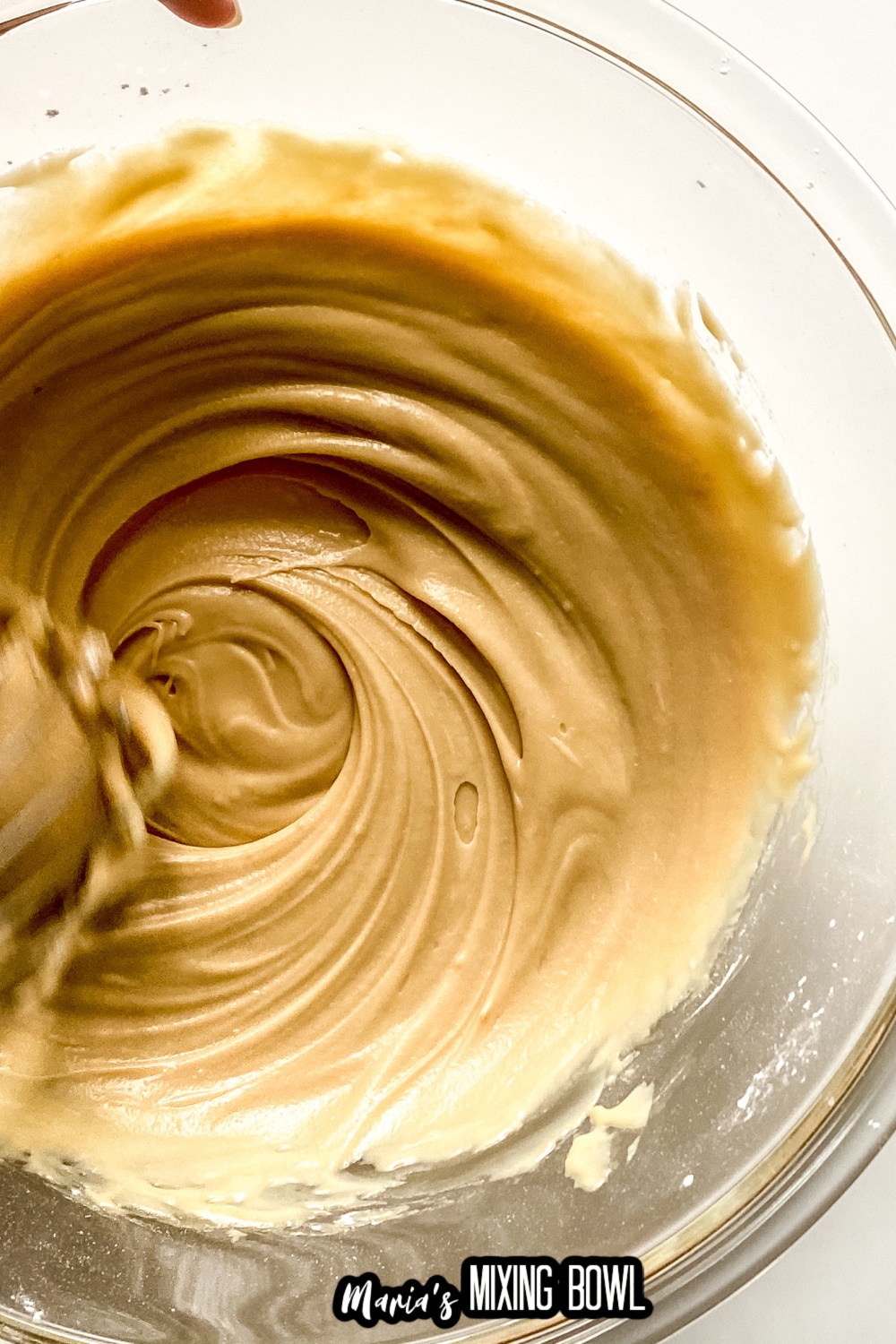batter in a glass mixing bowl