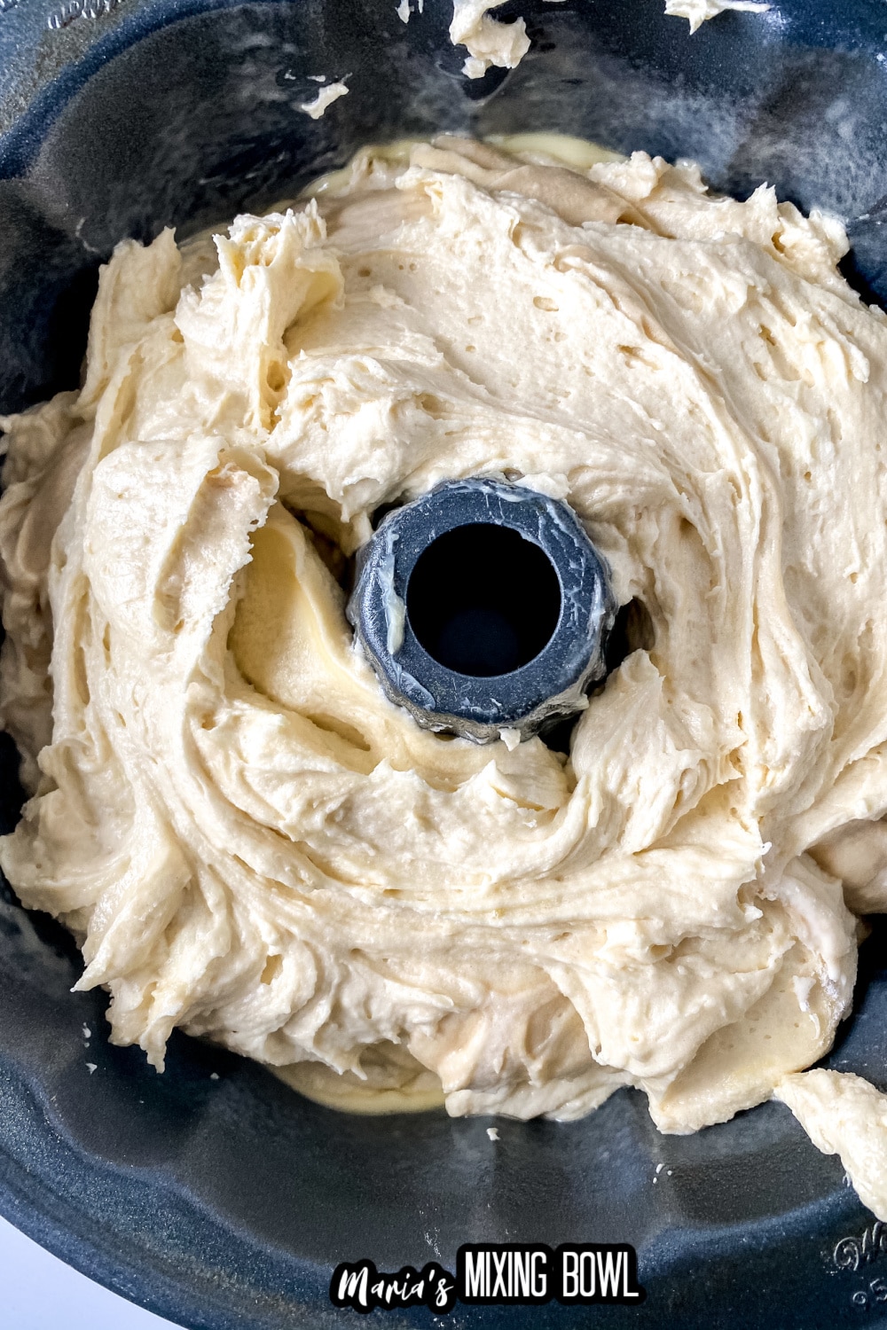 pound cake batter in a bundt pan