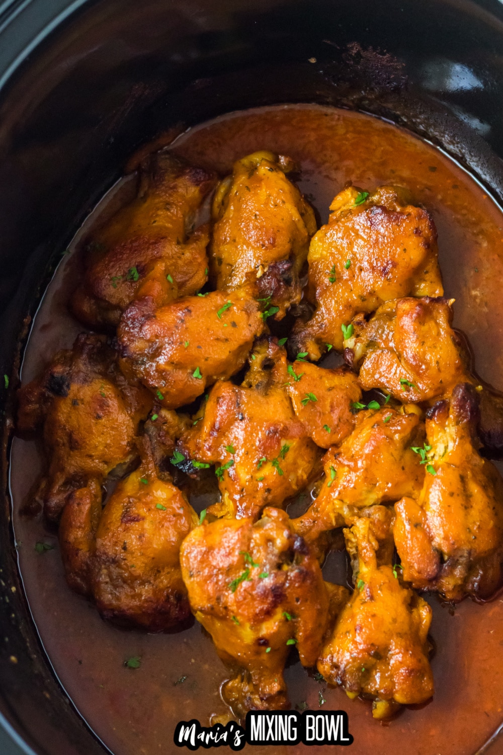 cooked wings in a slow cooker