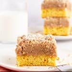 slice of double crumb cake on a white plate