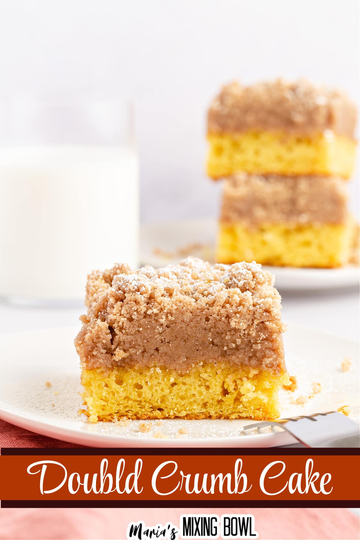 slice of double crumb cake on a white plate
