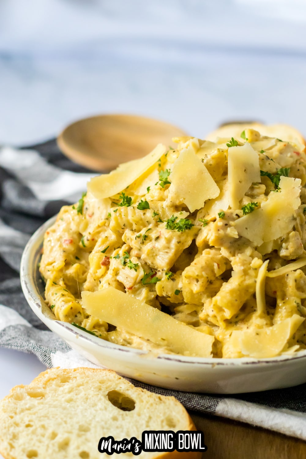 bowl of garlic parmesan chicken pasta on a white bowl