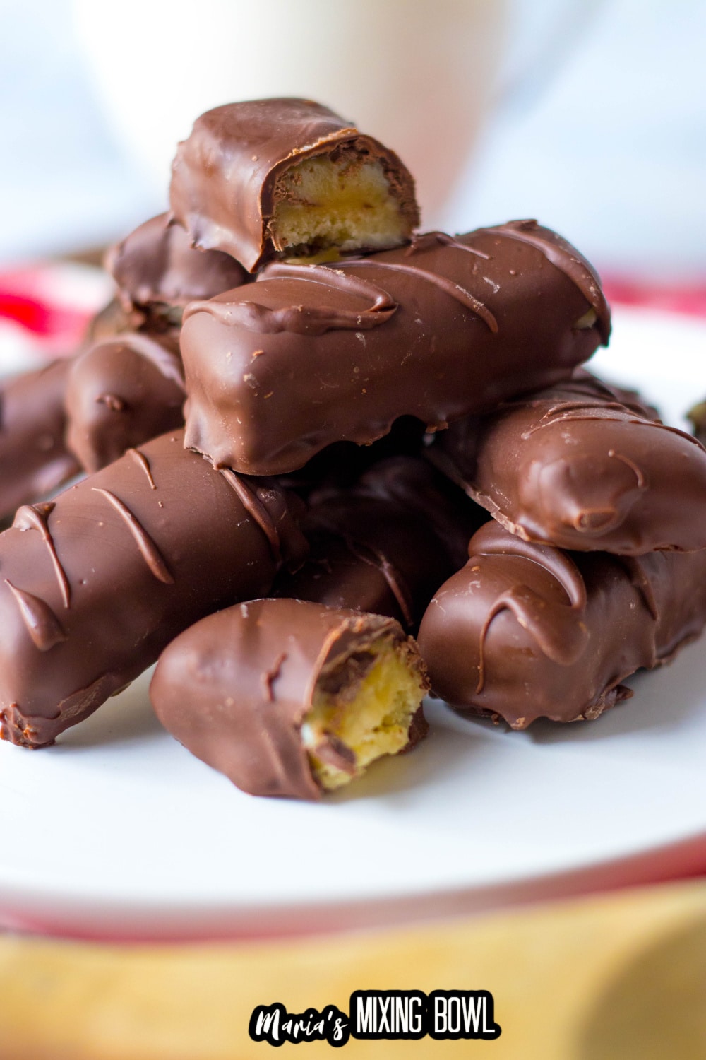 stacked twix on a white plate