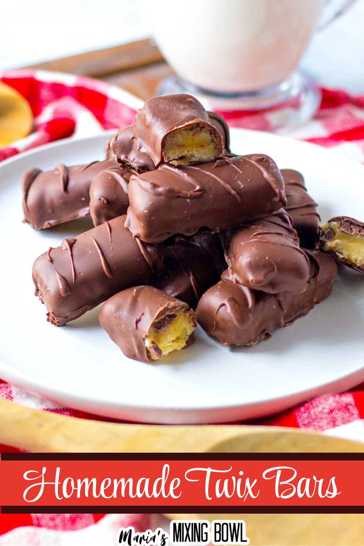 homemade twix bars stacked on a white plate