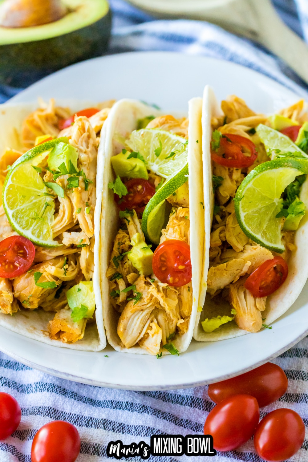 three honey lime chicken tacos on a white plate