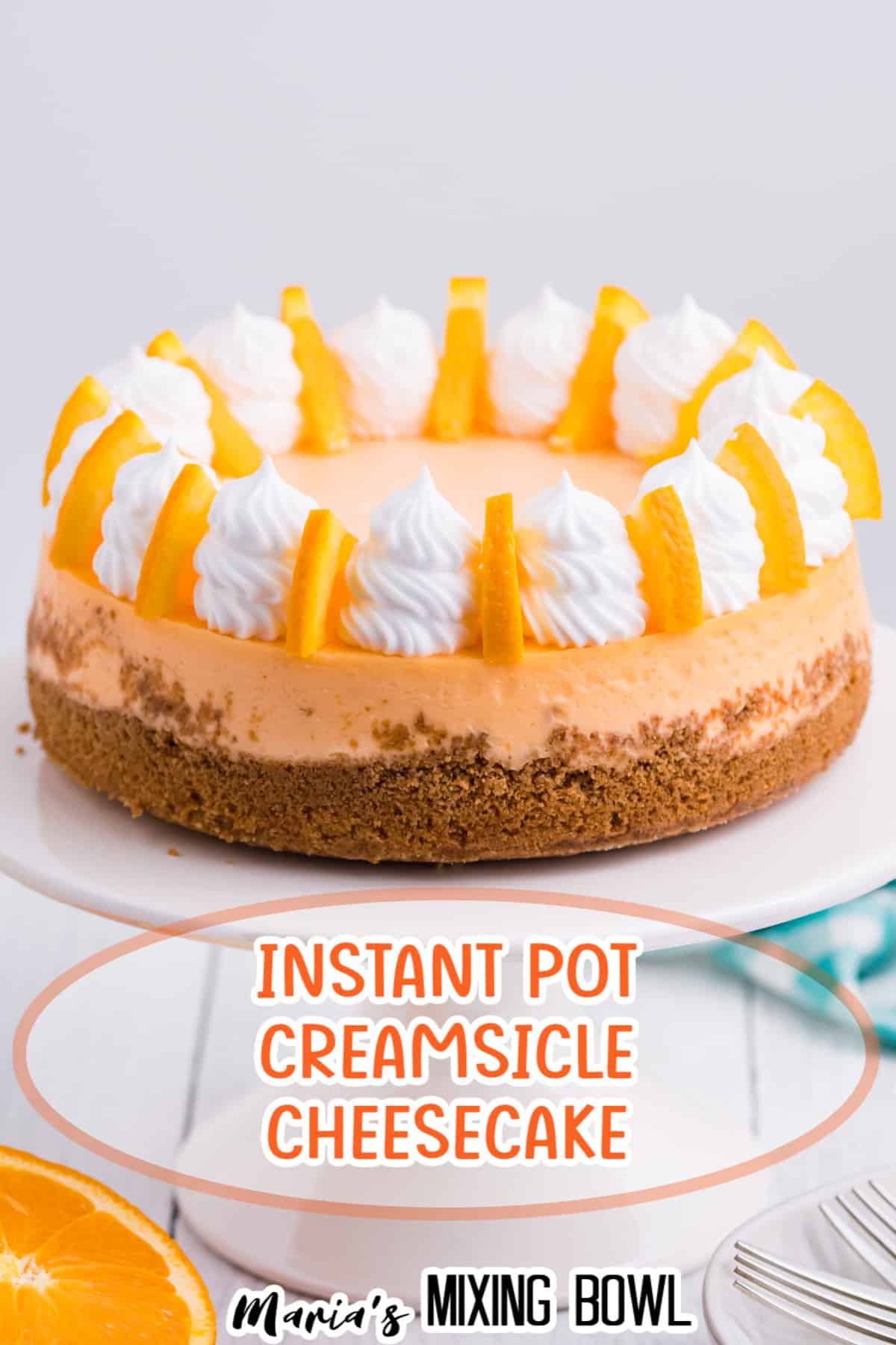 whole uncut cheesecake on a white cake stand