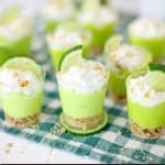 key lime pie shots on a green and white napkin