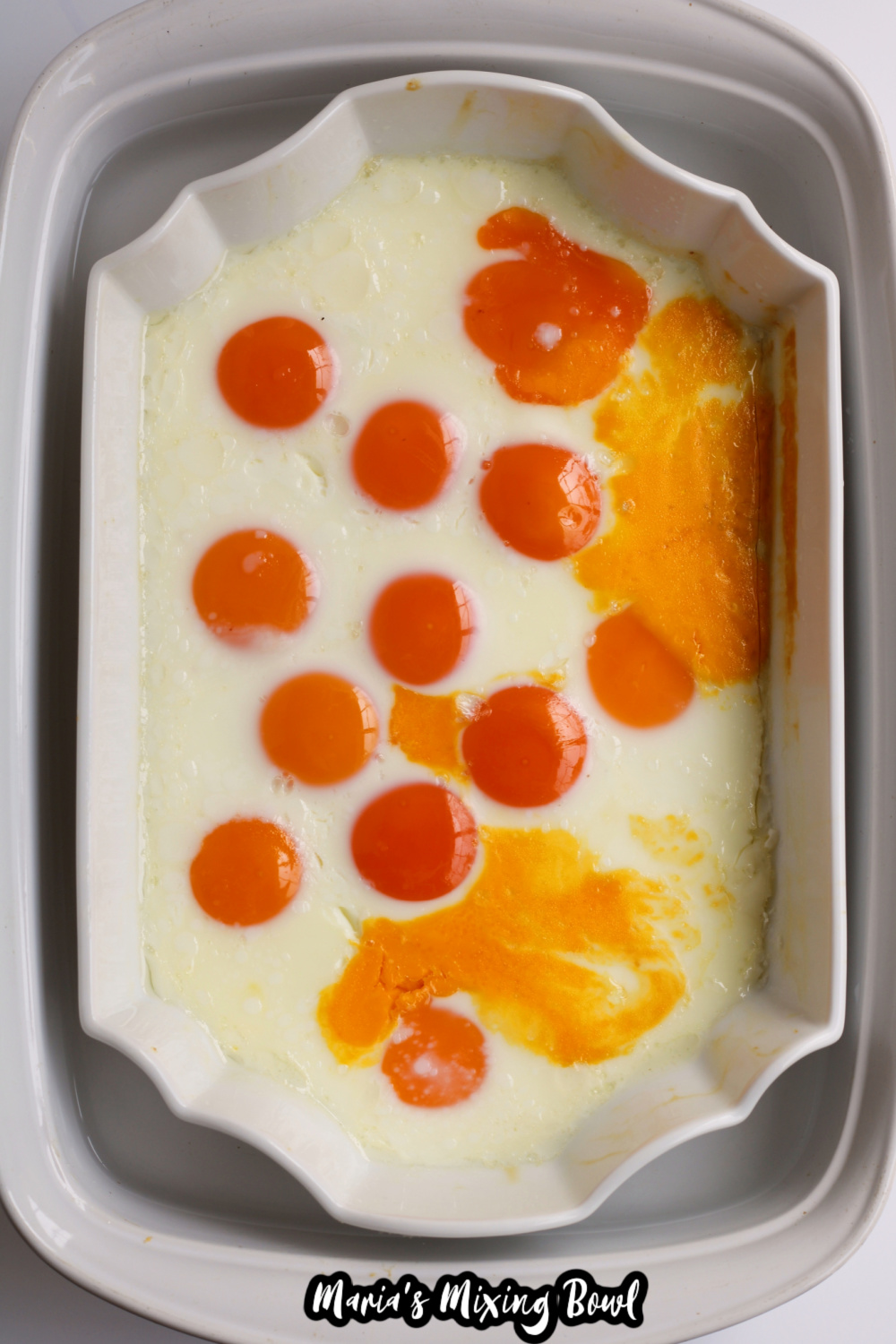 eggs cooked in a white baking dish