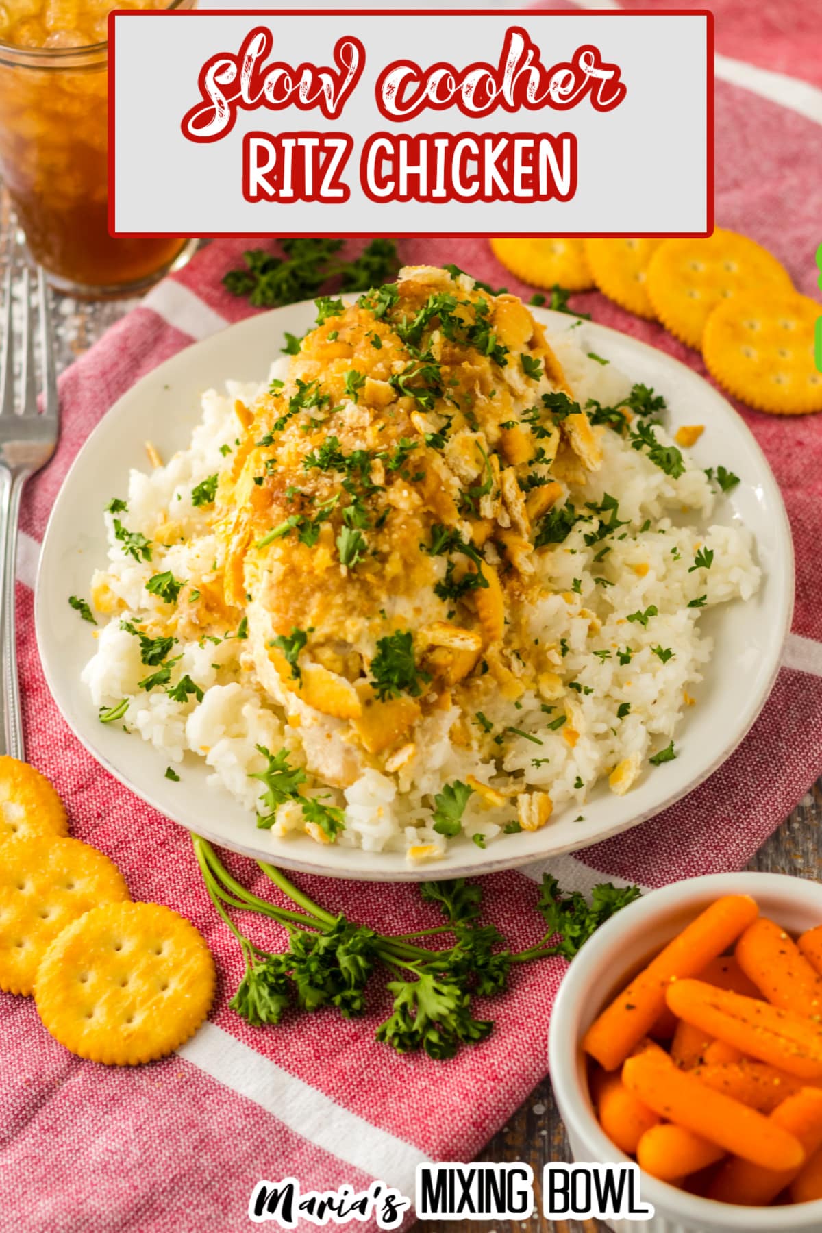 ritz cracker chicken breast on a bed of rice on a white plate
