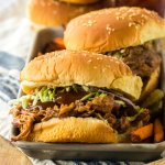 root beer pulled pork sandwiches on a metal serving tray