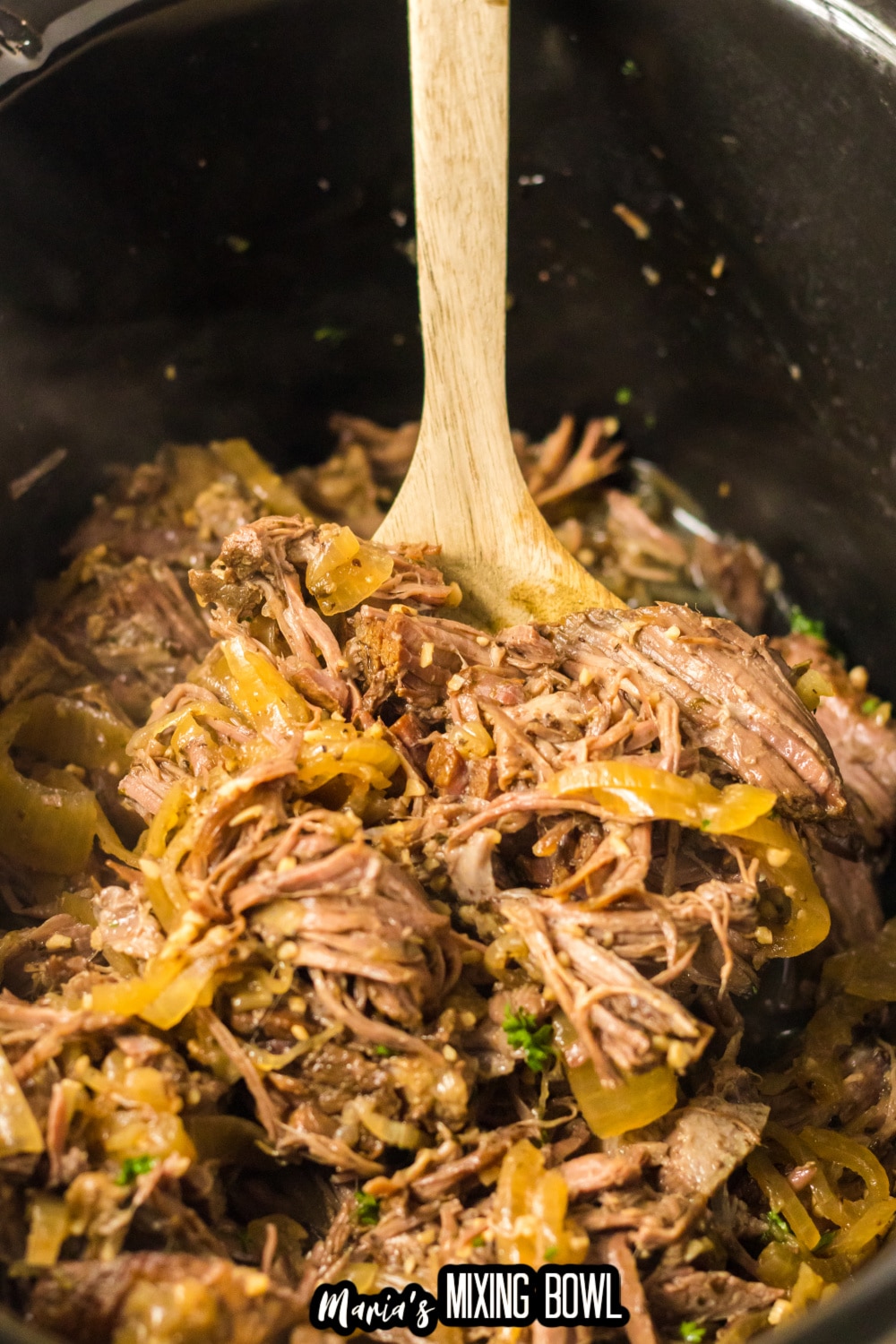 shredded gyro meat in a slow cooker