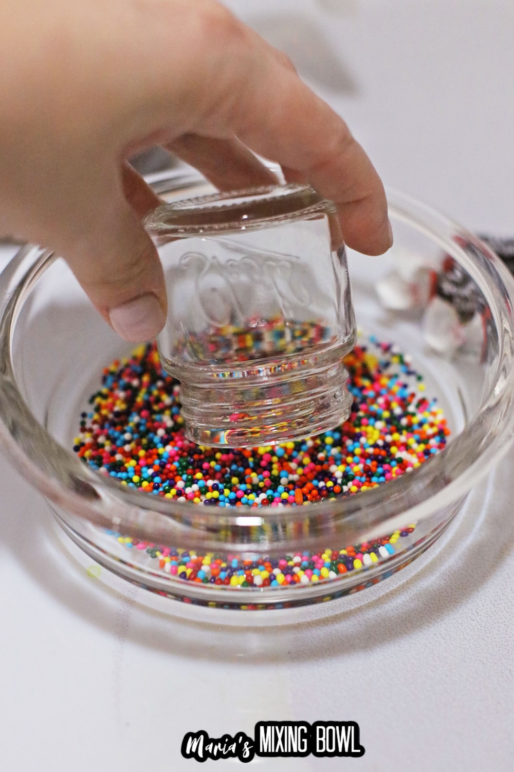 sprinkles being stuck to the rim of a glass