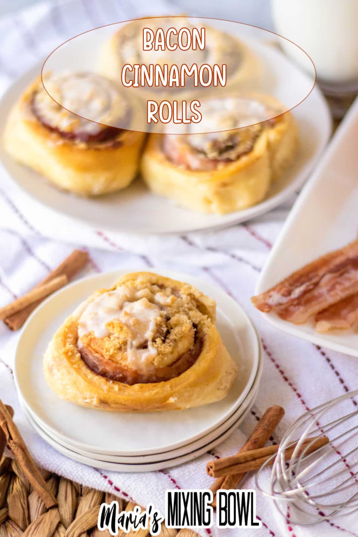 bacon cinnamon roll on three stacked small plate