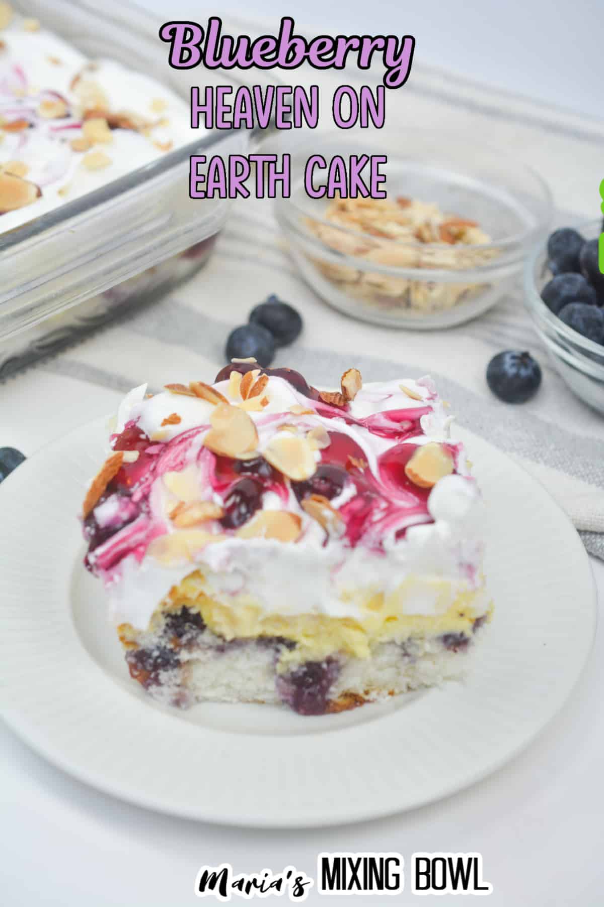 slice of blueberry heaven on earth cake on a white plate
