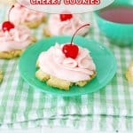 cherry cookie on a small green plate