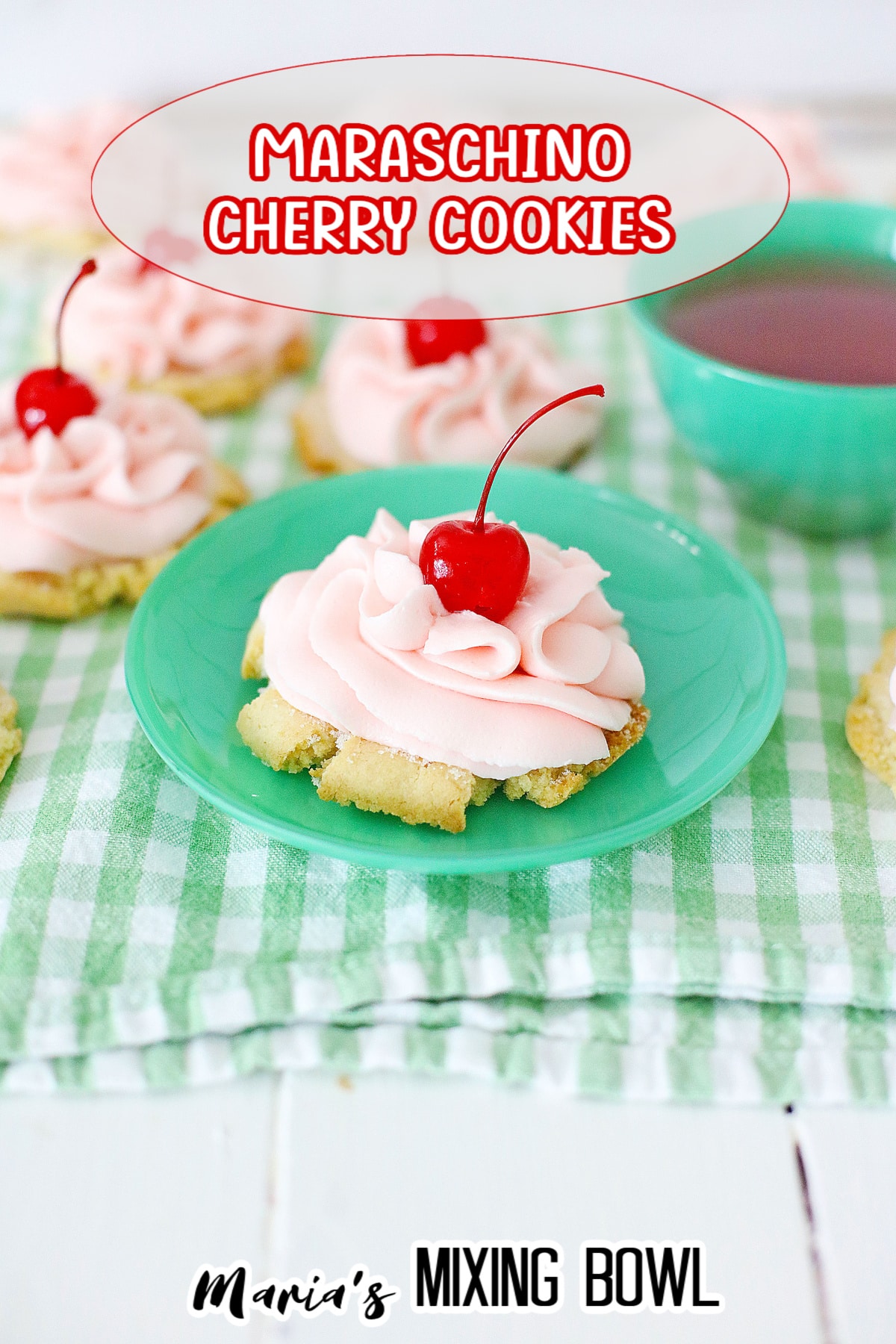 cherry cookie on a small green plate
