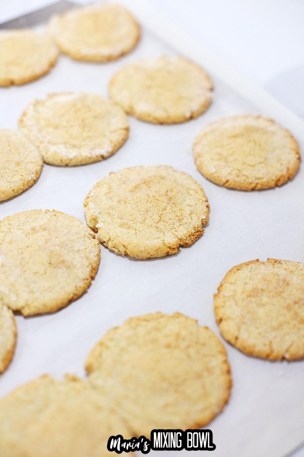 baked cookies on a parchment lined baking sheet