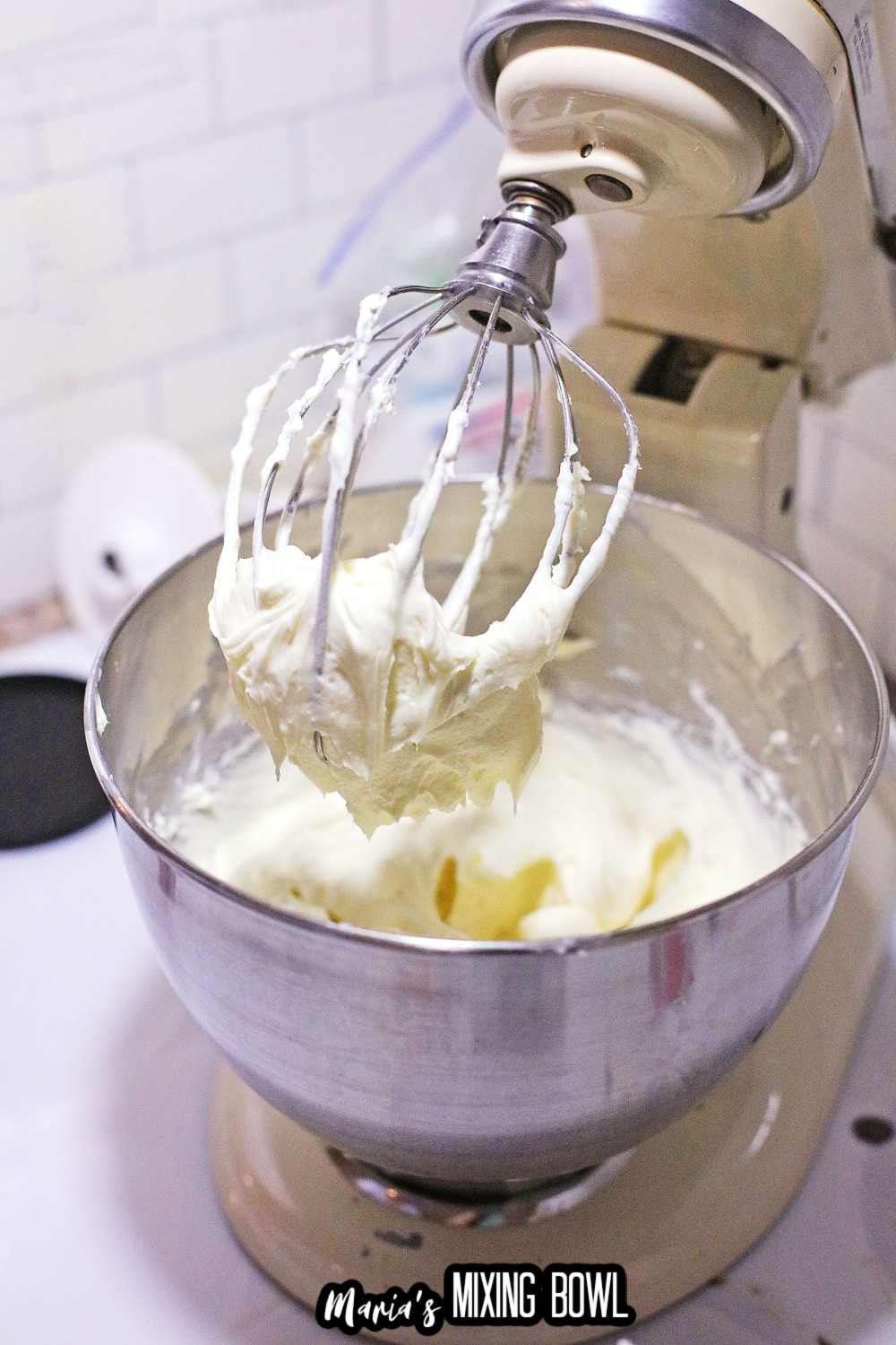 cream cheese an sugar in a kitchen aid mixer