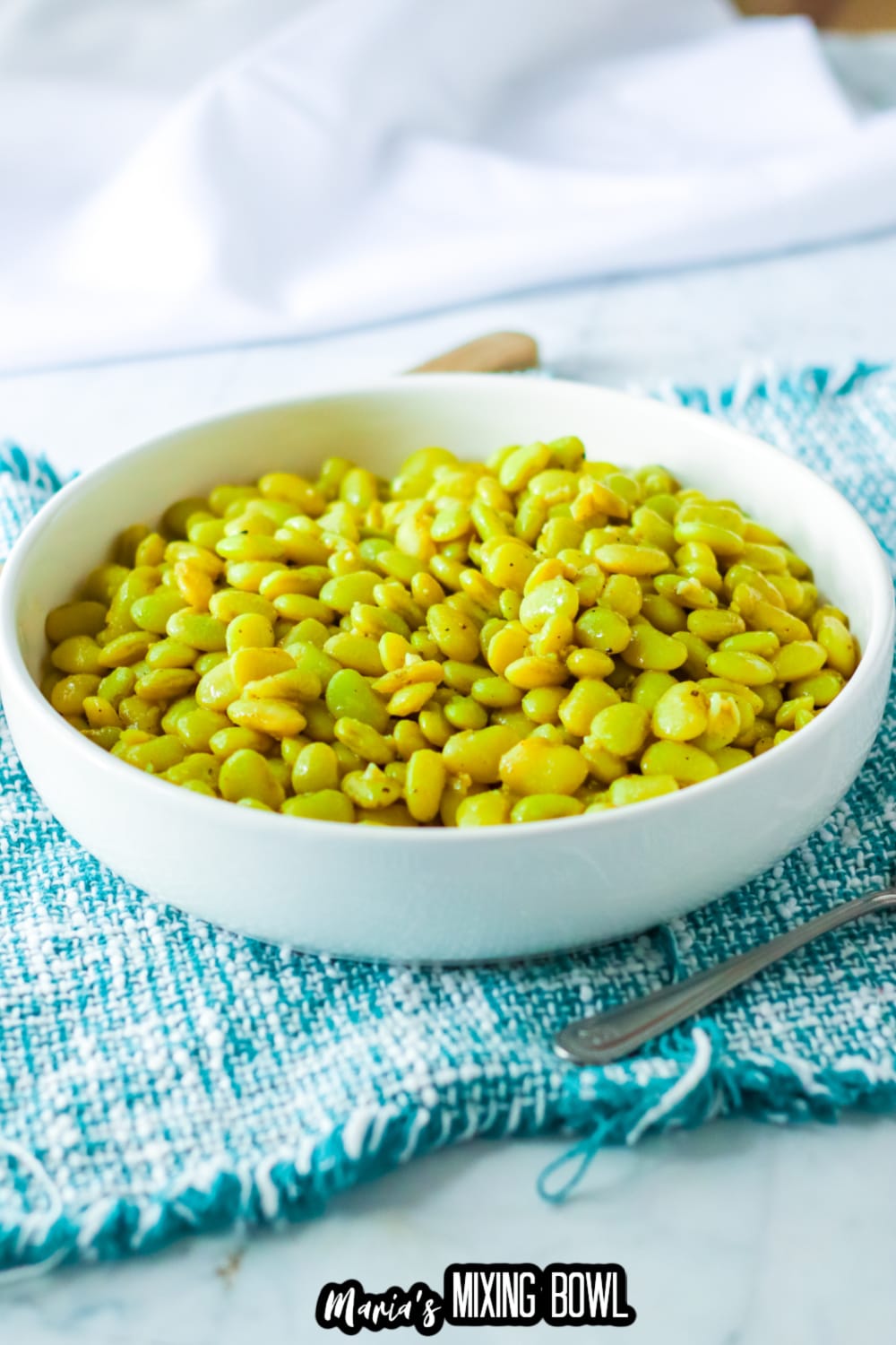 white bowl filled with cracker barrel lima beans