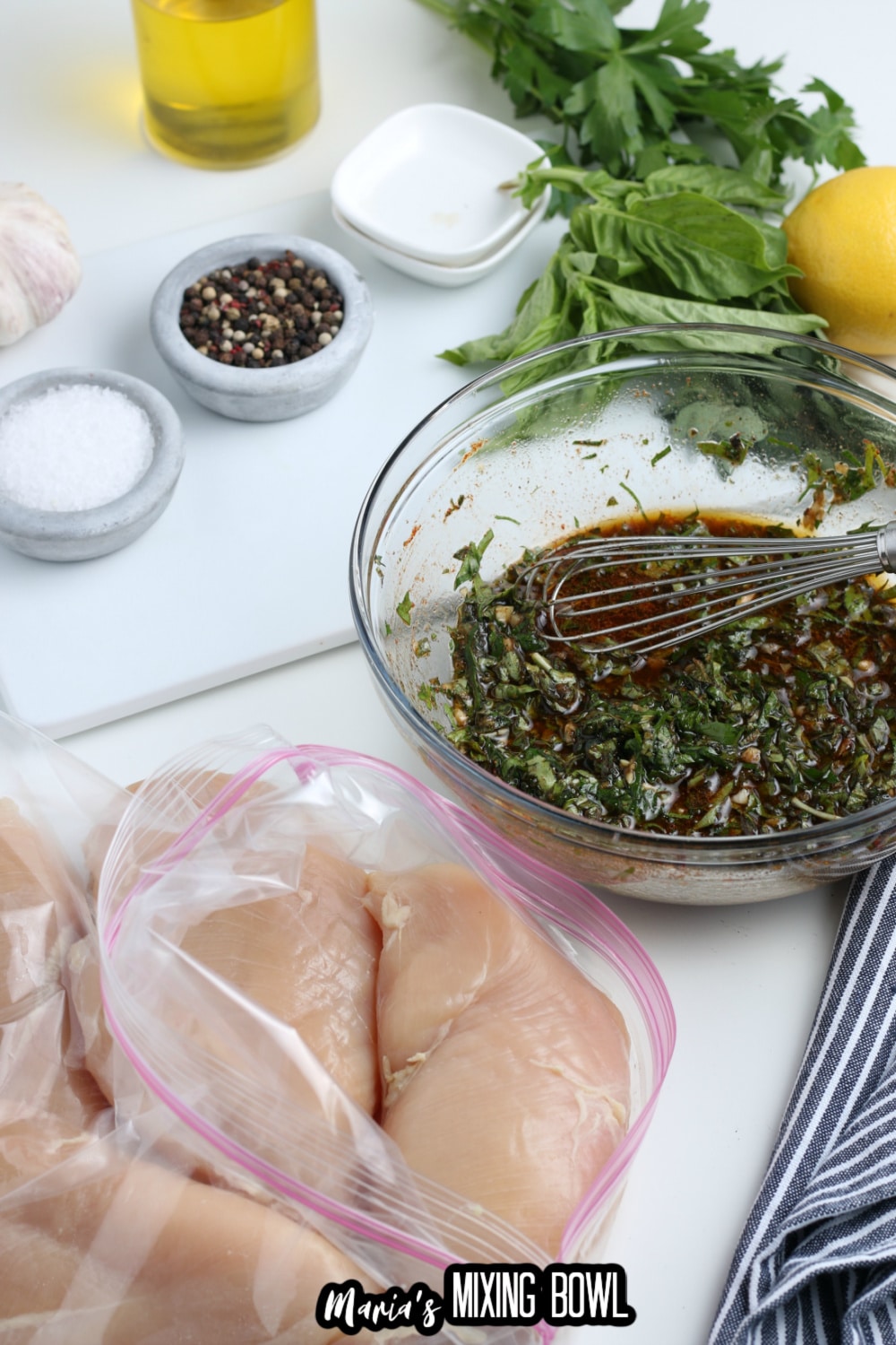 marinade being made in a small glass bowl with a whisk