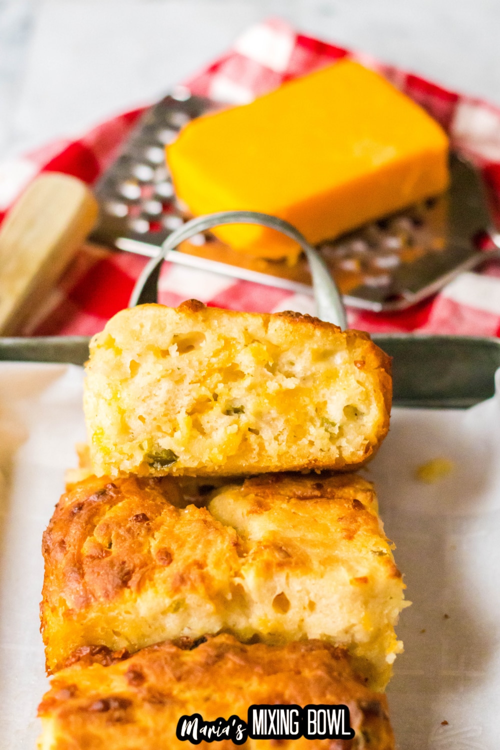 jalapeno cheddar biscuits on a metal serving tray