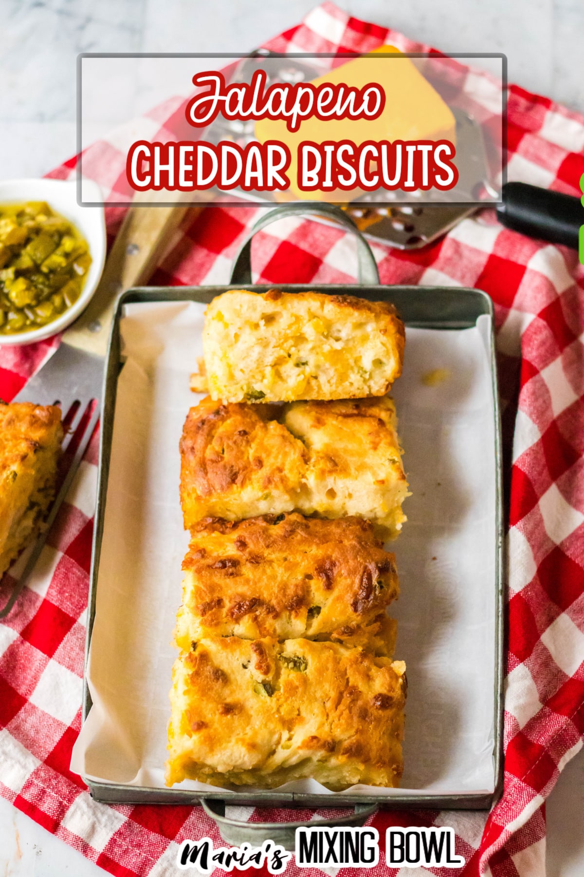jalapeno cheddar biscuits on a metal serving tray