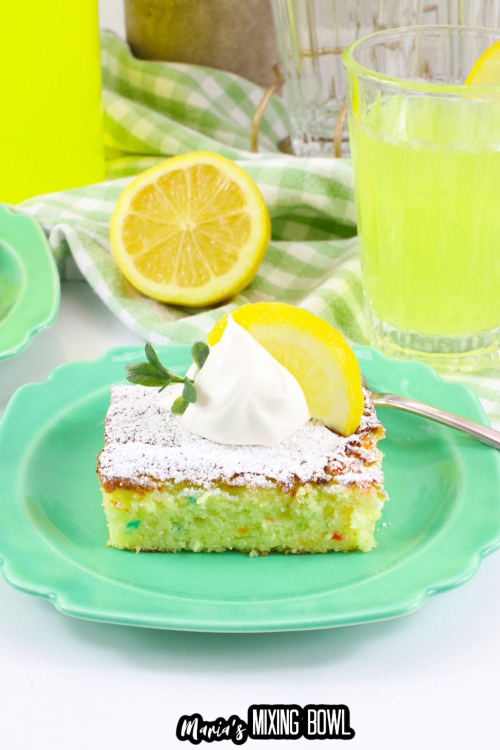 slice of lemon cake mix bars on a green plate