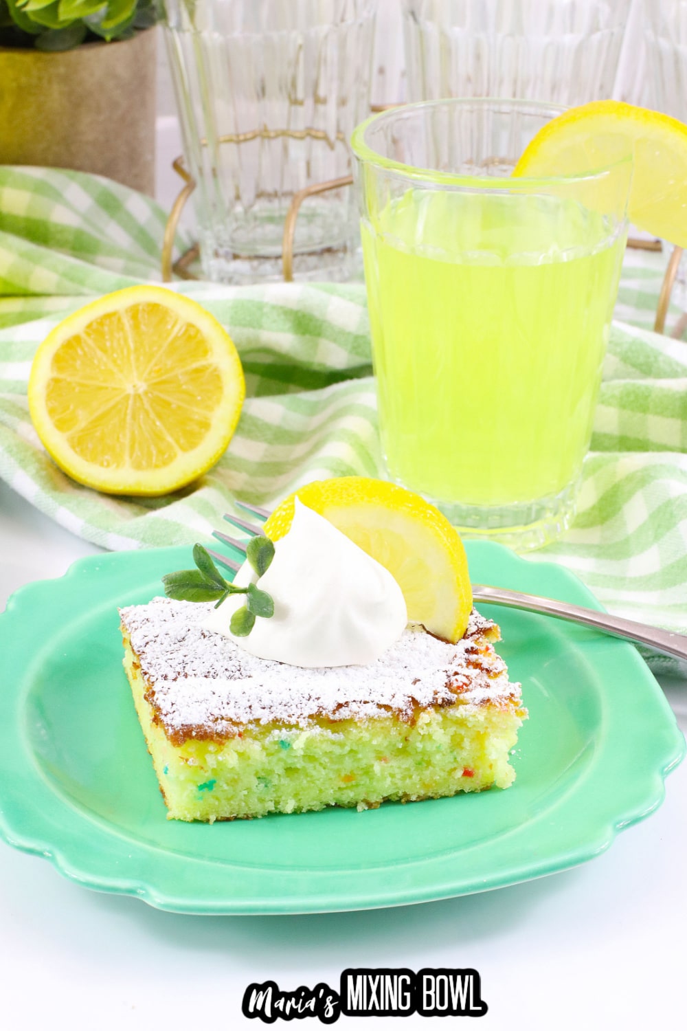 slice of lemon cake mix bars on a green plate