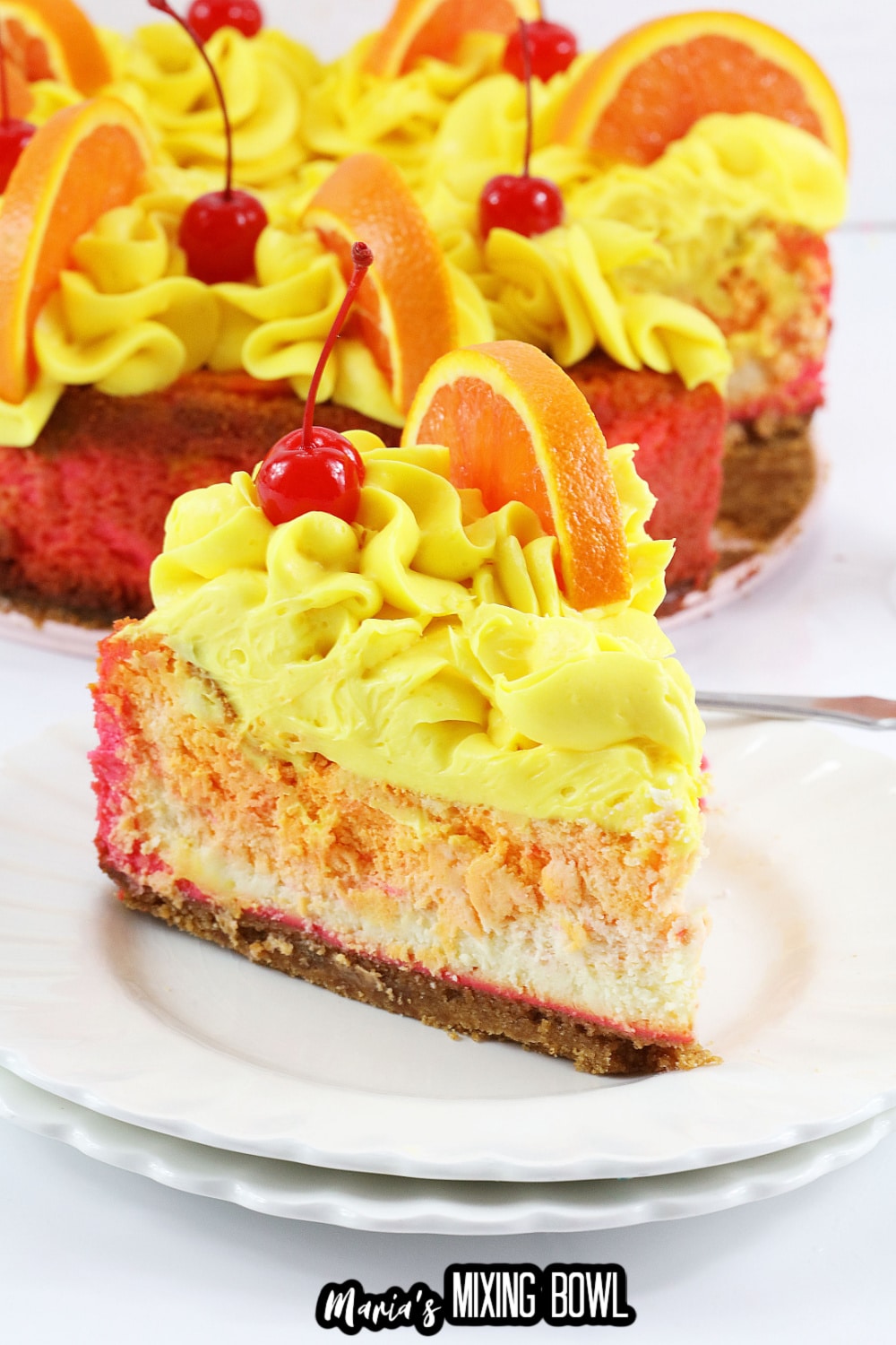 slice of malibu rum cheesecake on two small plates