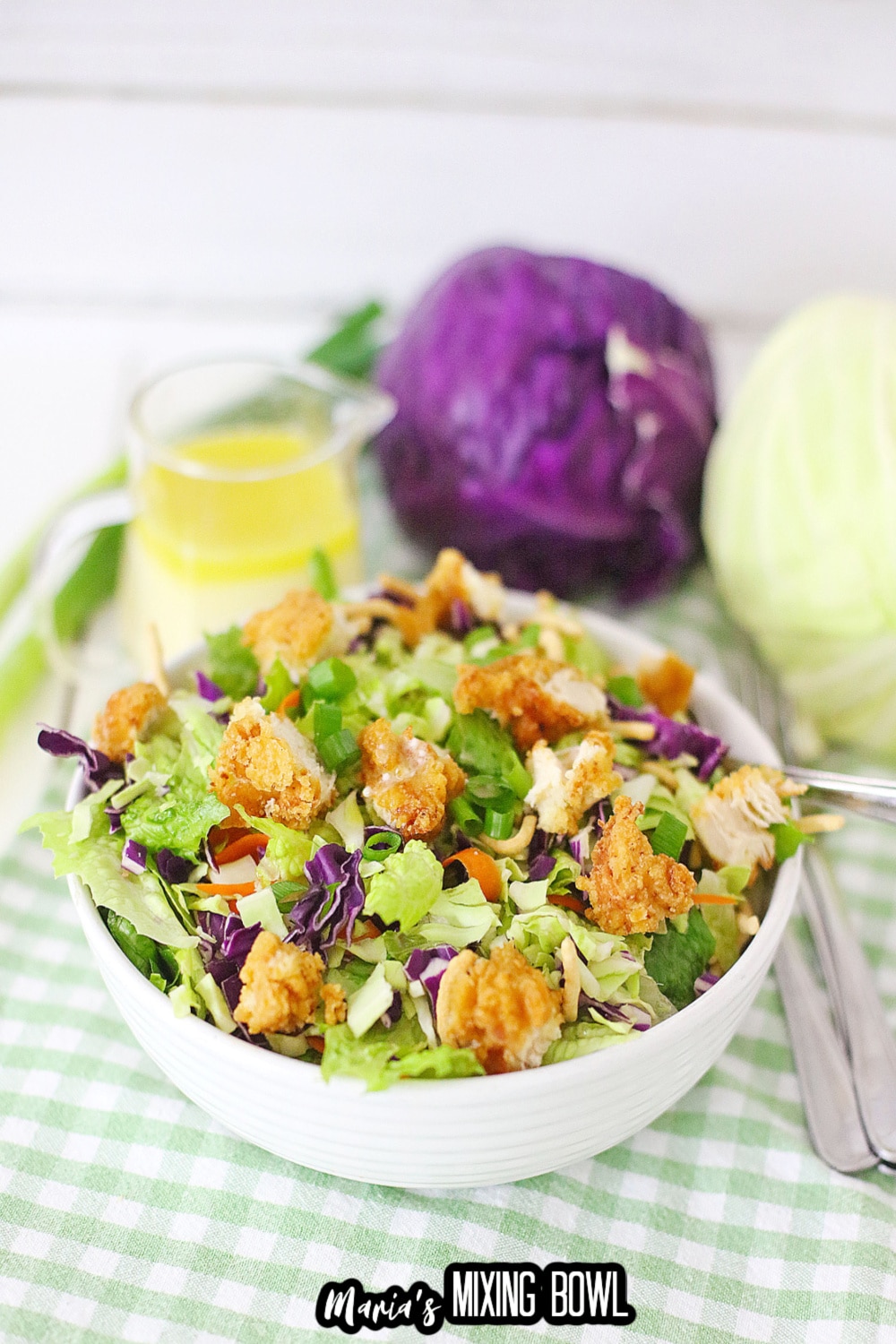 close up of a white bowl filled with applebees oriental chicken salad