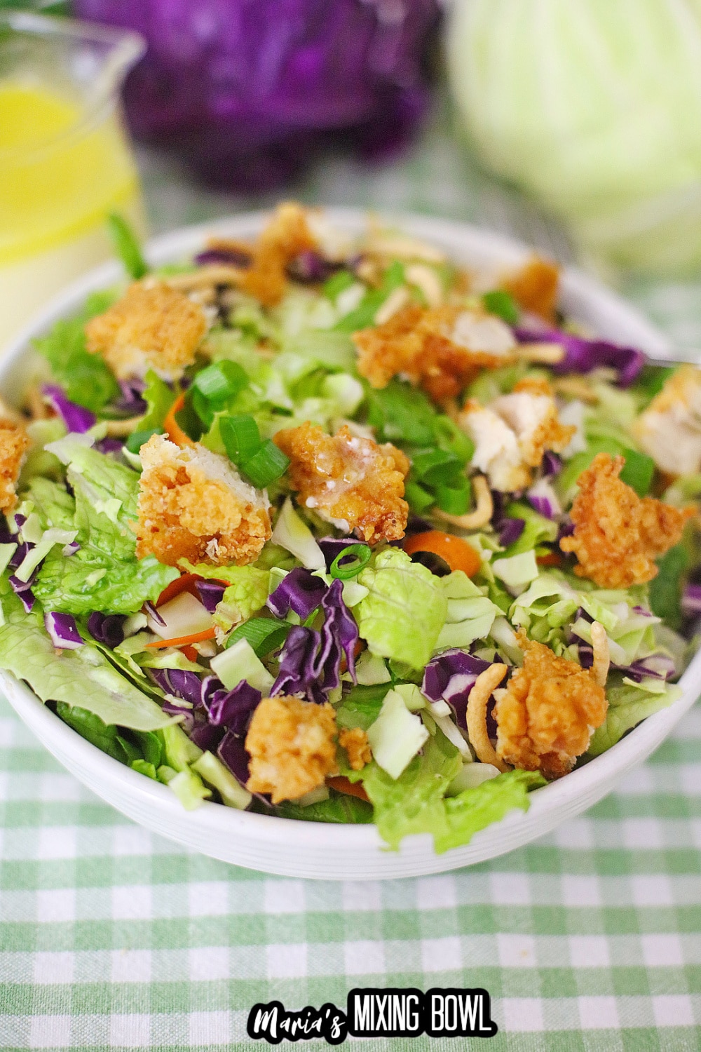 close up of a white bowl filled with applebees oriental chicken salad