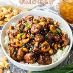 a white bowl filled with slow cooker cashew chicken and white rice