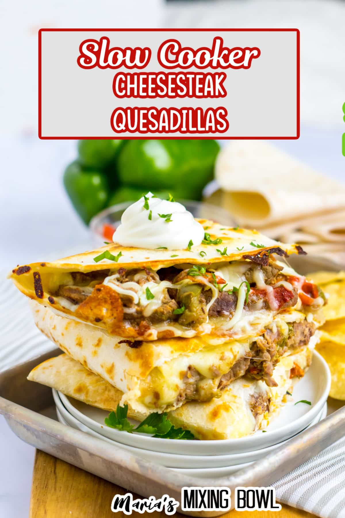 three slow cooker quesadillas stacked on a white plate