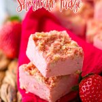 two pieces of strawberry shortcake fudge stacked on top of each other