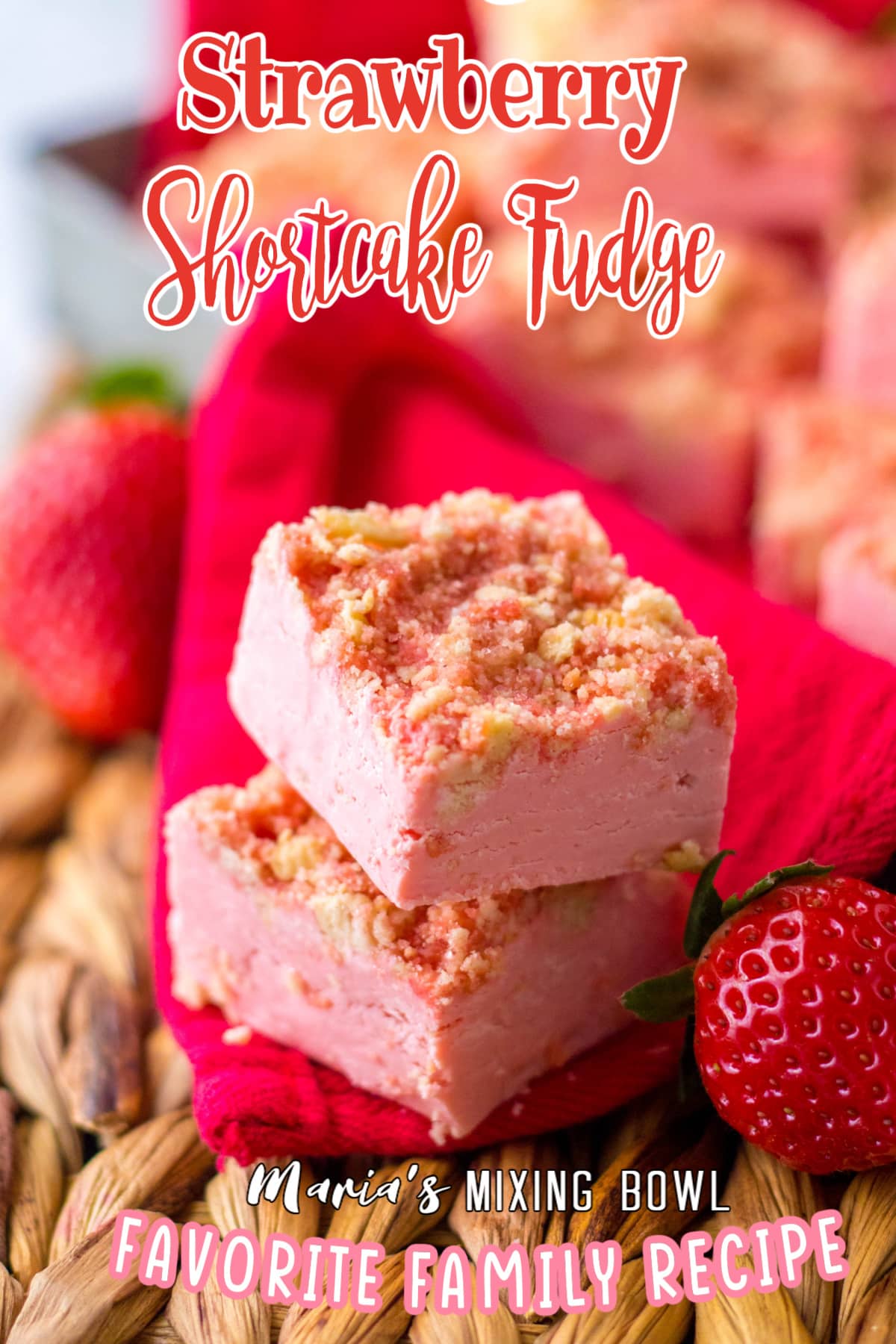 two pieces of strawberry shortcake fudge stacked on top of each other
