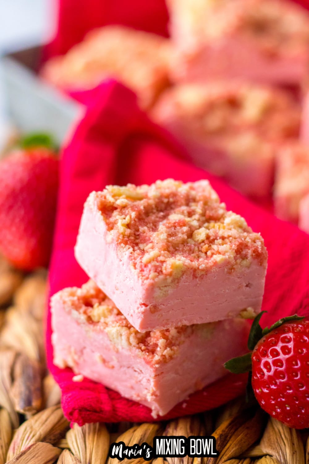 two pieces of strawberry shortcake fudge stacked on top of each other