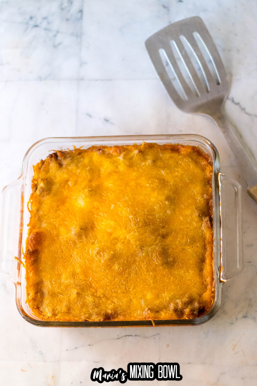 baked tamale casserole in a glass baking dish