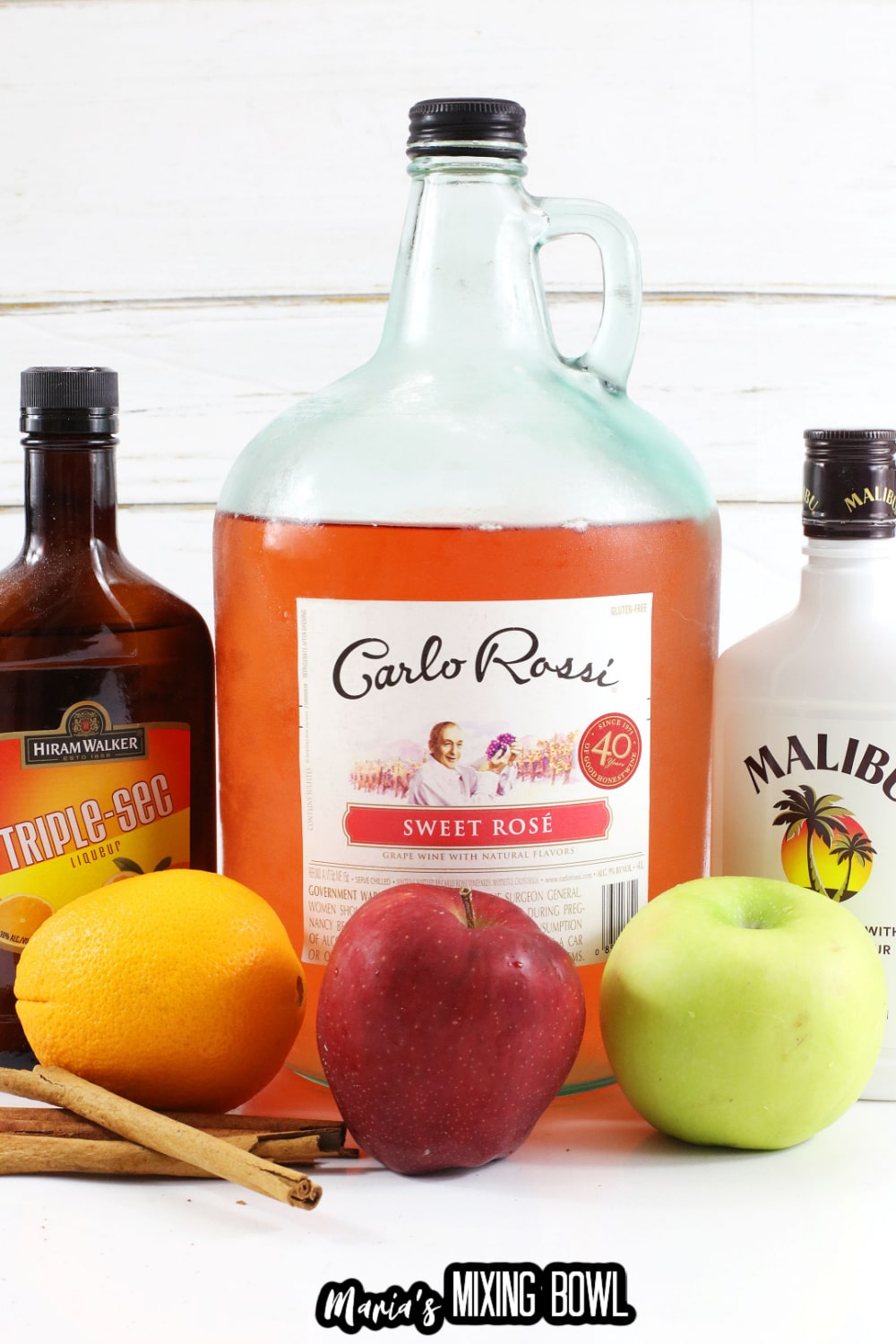 triple sec, rose, rum, orange, apples and cinnamon sticks