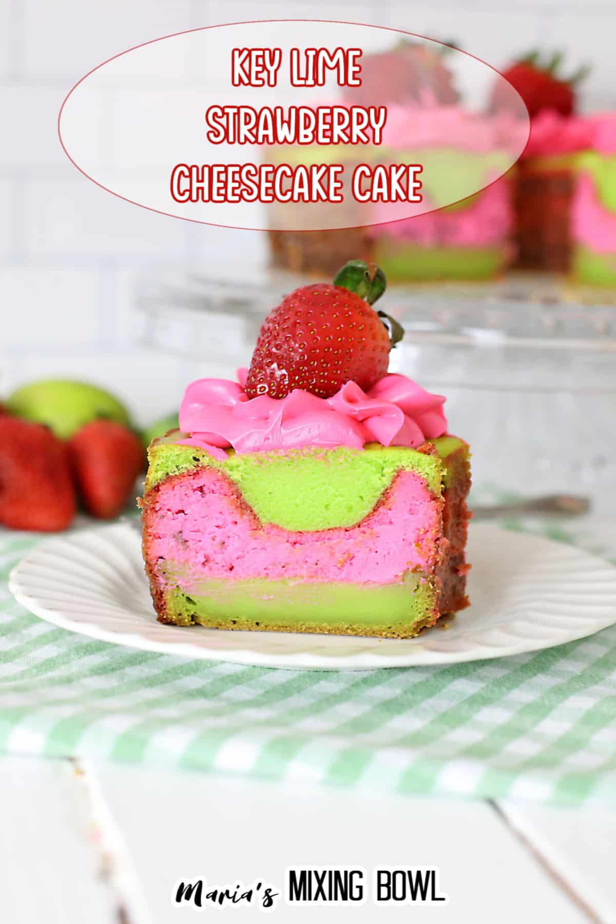 slice of key lime strawberry cheesecake cake on a white plate